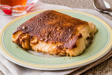 Turkish Dessert Kazandibi / milk baked pudding with tea