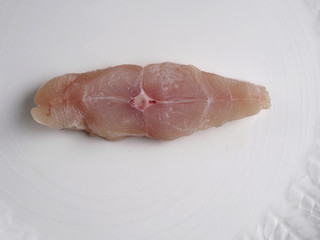 Sliced raw pompano on a plate