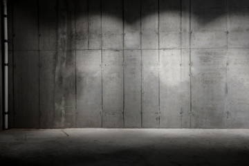 partially lit concrete wall construction site background