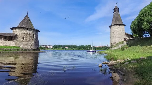 The place of confluence of the rivers Pskova and Velikaya protected by two historical towers in Pskov, Russia
