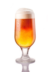 dark cold beer in frosty glass isolated on white