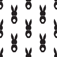 Seamless pattern with bunnies. Vector design illustation Happy Easter holiday symbols