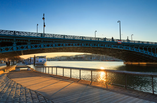 Bridge, Pont de l’Universite, over the Rhone river in Lyon on a sunny afternoon.