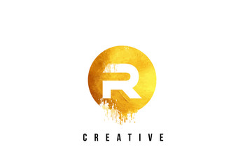 R Gold Letter Logo Design with Round Circular Golden Texture.