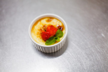 portion of creme brulee dessert