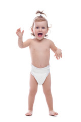 Happy kid in pampers shouting and playing in studio.
