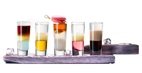 shots on wooden tray isolated on white background