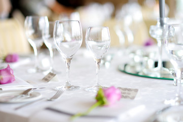Beautiful table setting with crockery and flowers for a party, wedding reception or other festive event