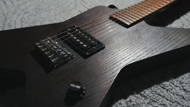 4k close-up of an electric guitar.