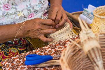 the villagers took bamboo stripes to weave into different forms for daily use utensils of the community’s people