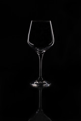 Empty wine glass. Isolated on black background