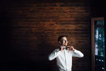 The fiance wears a butterfly