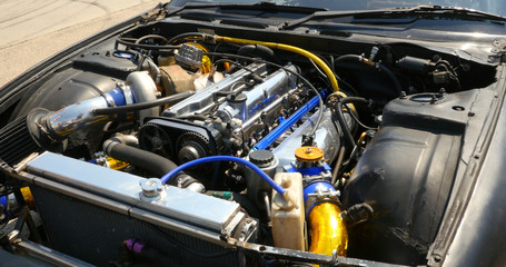 Fototapeta na wymiar Engine of the drift car in open hood