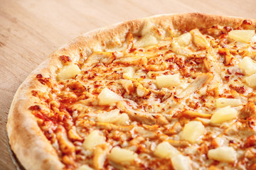 pizza with chicken, mozzarella, olives and basil top view with copy space