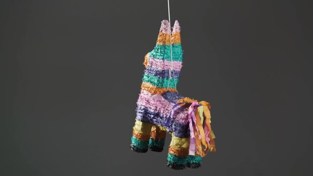 Colorful pi&ntilde;ata on a rope