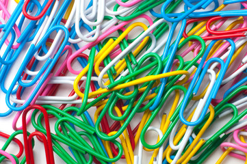 Color paper clips close-up texture