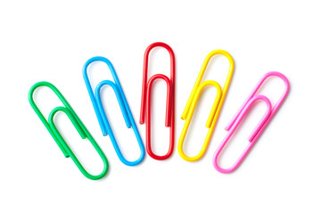 Colored paper clips macro close up isolated on a white background
