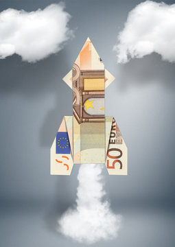 Startup financial business concept, rocket made of money