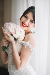 Naklejka premium beautiful portrait of young bride with flowers in the morning