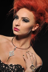 red hair girl model at the black background