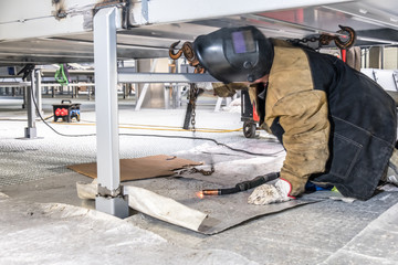 Metal construction worker with blurred motion