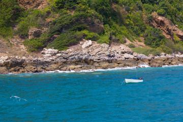 Fototapeta na wymiar little fishing boat near a shore