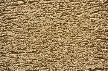 Modern grainy sandy-yellow stucco texture