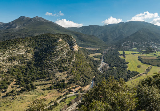 Escarpment and river valley at Patrimonio in Corsica