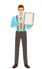 Businessman pointing at clipboard