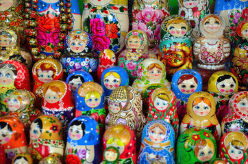Fototapeta premium Russian wooden nesting dolls on a shelf in a store