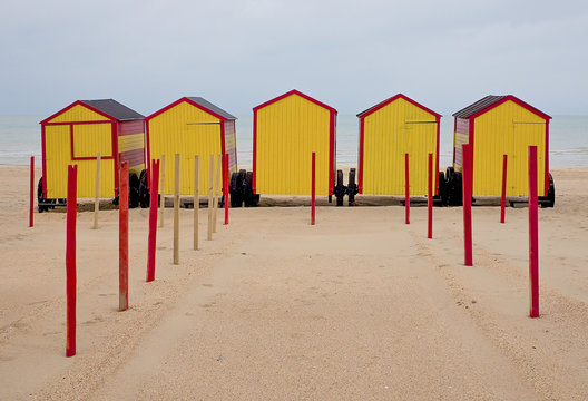 Row of colourful vintage beach houses in De Panne, Belgium.