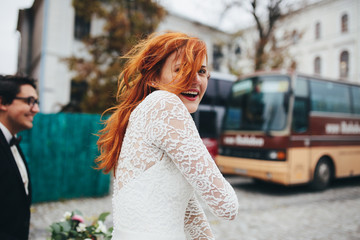 The brides walking along road