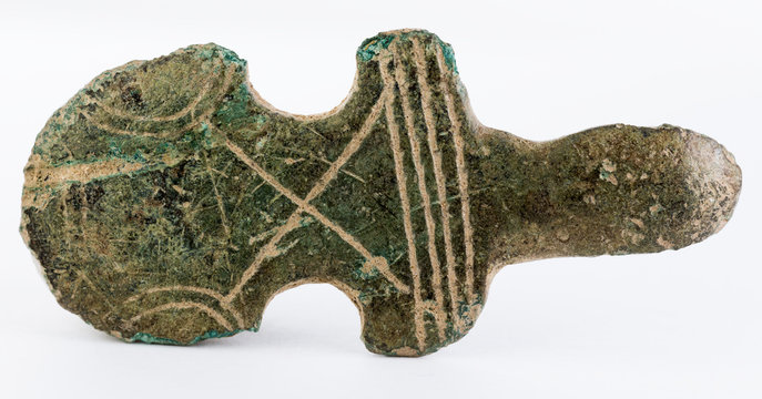 Ancient medieval adornment, possibly part of a buckle.