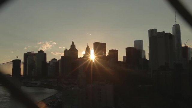 Skycrapers silhouetted by the settng sun in New York City, New York, USA