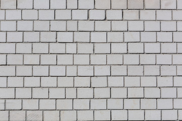 Strukturierter Hintergrund, Backsteinmauer mit weißen Ziegeln