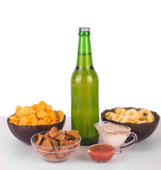 Beer and snacks on a white background