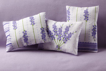 Three lavender cushions