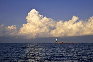 Clouds, lighthouse and sky