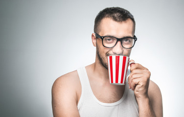 Man with cup coffee