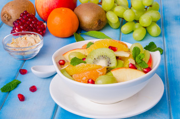 Fototapeta na wymiar Fresh fruit salad in a bowl. Healthy dish.