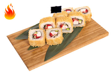 Sushi rolls on wooden Board with leaves of leeks and black sign for logo and name