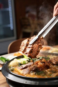 Mugeunji gamjatang. Pork Back-bone Stew with Ripe Kimchi.