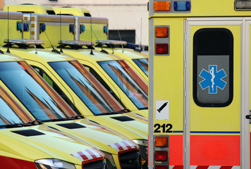 detail of emergency ambulance cars in hospital yard