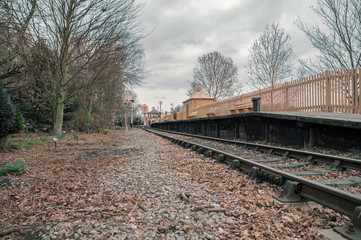 Fototapeta premium Single train track and station