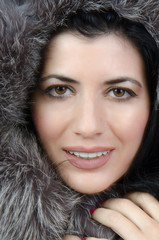 Girl in a warm fur coat