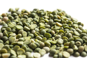 Green split peas on white background