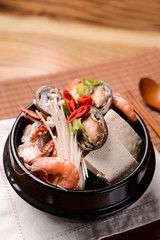 haemul ttukbaegi. Seafood Stew in a Hot Pot.