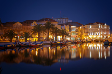 City of Aveiro canals with moliceiro tradicional boats in Portugal