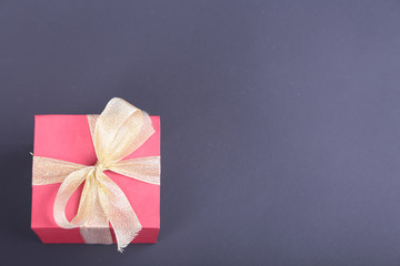 Gift boxes with bow on black background