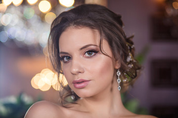 young beautiful bride with make-up and styling